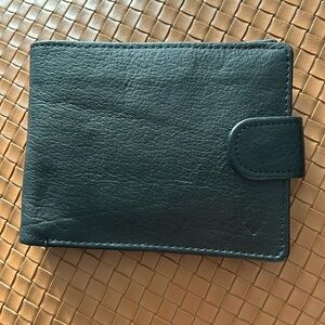 Bi-fold leather wallet. Black. Several compartments. New